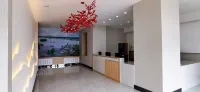 Xinbaixin Hotel (Meihekou Railway Station Branch) - parking