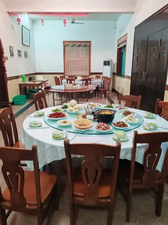 Longyinju Hostel Отели в г. Тунлу