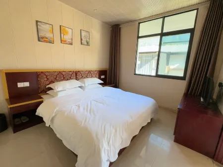 Wenchuan Yuzixi Homestay Отели рядом с достопримечательностью «Baihua Bridge Relic Site»