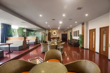 XINHUA HOTLE Отели рядом с достопримечательностью «Shigu Academy»