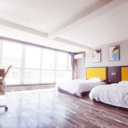 Pebble Motel Hotel (Chaoyang Beipiao Passenger Station)