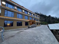 Zhagana Longbao Homestay Hoteles en Têwo