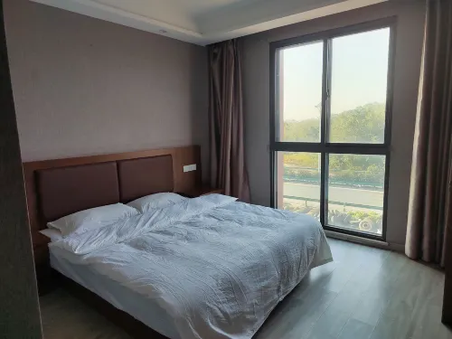 Dongmei Hotel - Gasthöfe