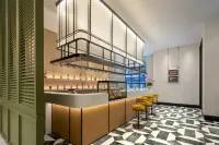 Holiday Inn Mile - بار