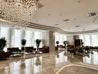 Urumqi Yuehua Zhenxiang Hotel - Bãi đậu xe