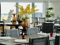 Qingdao Atla Scenic Hotel (Golden Beach Petroleum University) - ที่มีบาร์