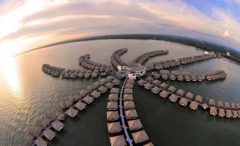 aerial view of a resort on a large body of water , surrounded by multiple buildings at Avani Sepang Goldcoast Resort