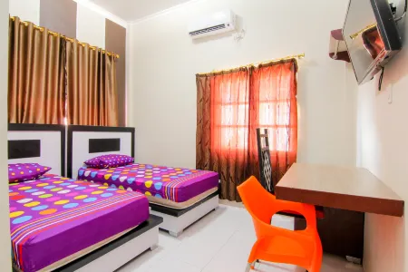 Trans Bandara Residence Отели в г. Делисерданг