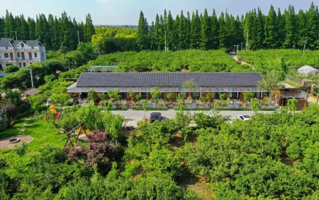 Shanghai Country House Shihu Theme Homestay Отели рядом с достопримечательностью «Xisha Wetland»