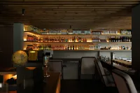 Xijiang Sanchunli · Meng Vacation Apartment - bar