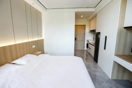 Xinxin Modern Light Luxury Homestay Отели рядом с достопримечательностью «Northeast All Day Mall»
