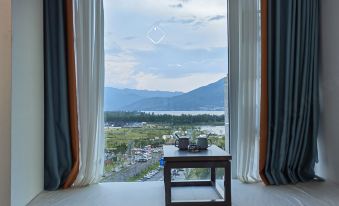 Xichang Aiboman Light Luxury Hotel (Qionghai 17 Degree Shop)