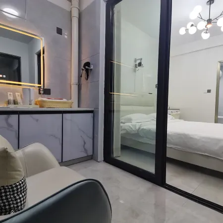 Jiuhang Lingchen Apartment (Wanhe City Commercial Plaza)
