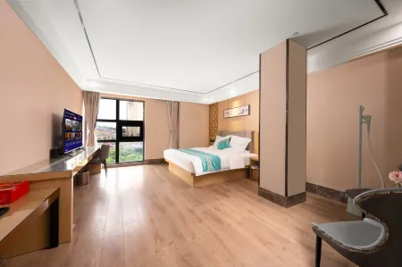 Fengbang Hotel (Kunming University Town South Metro Station) Отели рядом с достопримечательностью «Yunnan Minzu University (Yuhua Campus)»