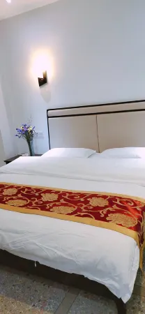 300 Mountain Hot Spring Business Hotel Отели рядом с достопримечательностью «Sanbaishan Mountain Scenic Area»