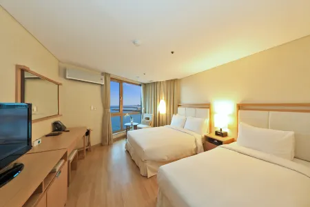 Ocean Suites Jeju Hotel Отели рядом с достопримечательностью «Драконный головный рок»