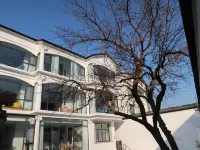 Suzhou Yuehu Yinjv Boutique Homestay (Taihu Lake Dongshan Scenic Area Branch) Hotel in zona Qiyuan Garden