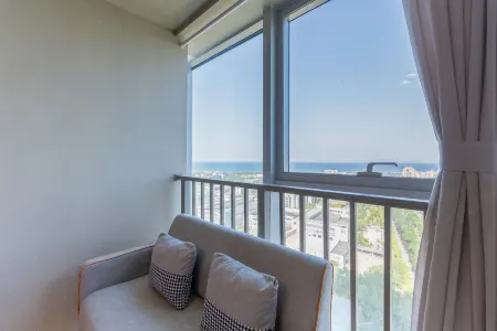 Luosheng Guanhai Electric Sports B&B (Yantai University Shop) Отели рядом с достопримечательностью «Wenjing College Yantai University»