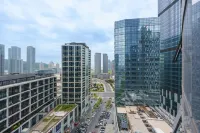 Dalian Xinghai Square Qingchen Floating Light Luxury Hotel Apartment - con vista montagne