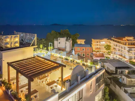 Xiamen Xihai Bay Hotel（Huandao Road） Отели рядом с достопримечательностью «One Country Two Systems Beach»