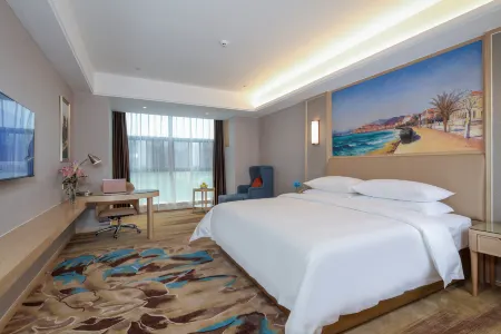 Vienna Hotel (Xingren Hotel) Отели в г. Синжэнь