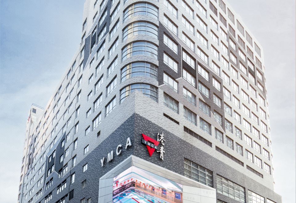 The office building across the street has large windows and can be seen from the exterior at The Salisbury YMCA of Hong Kong