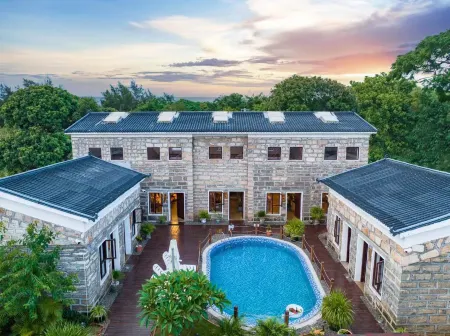 Floral Hotel·Guyuan Hotel Отели рядом с достопримечательностью «Shell Beach»