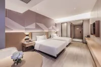 Borrman Hotel (Maoming High-Speed Railway Station Aiqinhai Shopping Park) - romantici