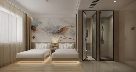 Song Yue Hotel Отели рядом с достопримечательностью «Harbin Huaxia Institute of Computer Technology (Qianshan Road)»