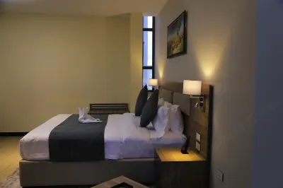 Triple E Hotel and Spa Hotel dekat Sholla Market