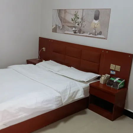 Huxian Youjia Business Hotel Отели рядом с достопримечательностью «Библиотека Сианьского нефтяного университета (Юйуйский кампус)»