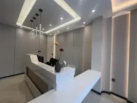 Dongfeng Qiduo Apartment Hotel di Dongfeng