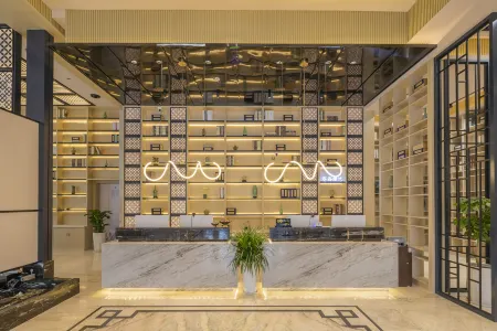 Kong Gu You Lan S Hotel (Ningbo Yuyao Hemudu Fashion Commercial Center Wenshan Creative Plaza) Отели рядом с достопримечательностью «Former Residence of Wangyangming»