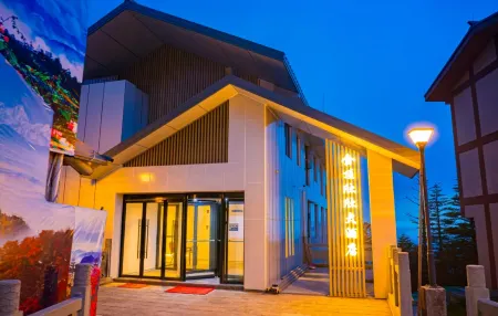 Jinding Xinxin Hotel Отели рядом с достопримечательностью «Jiulao Cave»