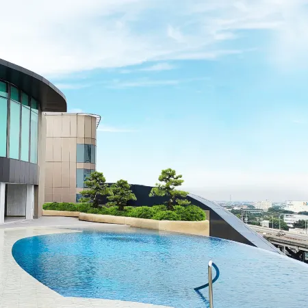 Asawin Grand Convention Hotel Отели рядом с достопримечательностью «Таиланд Поуст»