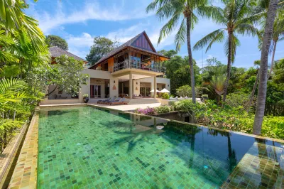 Villa Praison Hôtels à : Plage de Nai Yang