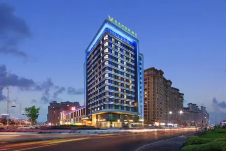 Vienna International Hotel (Harbin Songbei New Area Store) Отели рядом с достопримечательностью «Heilongjiang Infotech Profession College (Xueyuan Road)»
