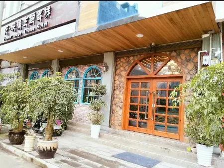 Luoping Huaying Image Theme Inn Отели в г. Луопинсянь