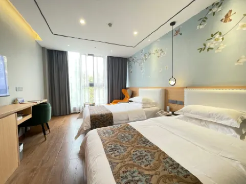 Huixin Holiday Hotel Отели рядом с достопримечательностью «Nantong Mining Industry Company Workers Culture & Sport Center»