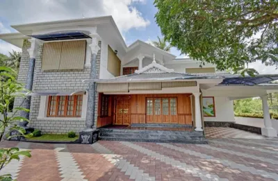 Merryland Holidays Hotels near Aduvassery Home Ground