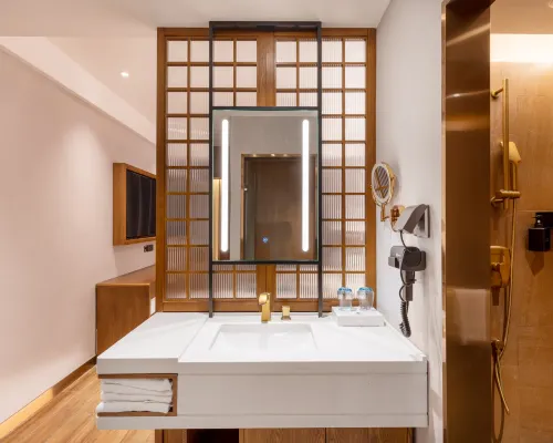 ZK Hotel (yizhuangjingjikaifaquMaqiqiao Branch) Zimmer Photos