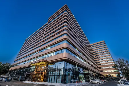 Changchun Rui Bang International Hotel Отели рядом с достопримечательностью «Changchun Vocational Institute of Technology»