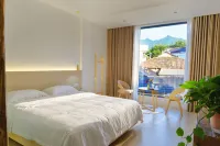 A guesthouse（Moon Bay Scenic Spot Store, Guanzhong Line, Yunnan ） - con vistas a la montaña