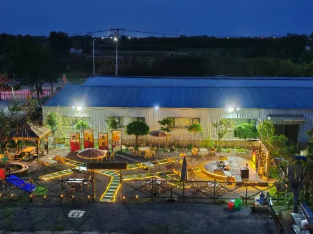 Longshanwan Guoleyuan Resort Отели рядом с достопримечательностью «Rizhao Coastal National Forest Park»