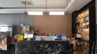 Yueji Apartment (Jinan Changqing University Town Commercial Street) - Bãi đậu xe