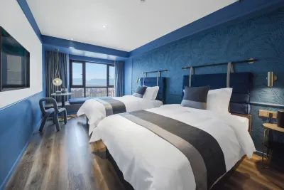 Kunming Ramuja Hotel Отели в г. Новый западный автовокзал