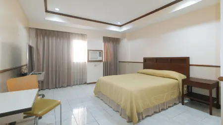 Garden Plaza Hotel Manila Отели рядом с достопримечательностью «Текнолоджикал Юниверсити оф Филиппины - Манила»