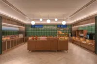 Orange Hotel (Turks Bagua City Taijitan Branch)