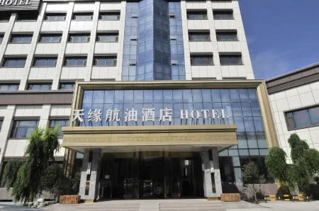 Tianyuan Hangyou Hotel (Urumqi International Airport) Отели рядом с достопримечательностью «Xinjiang University of Finance and Economics»