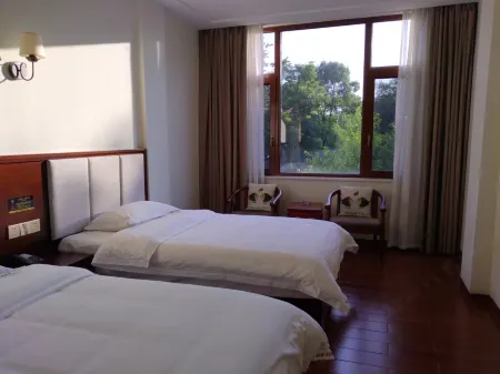 Dongli Chinese Inn (Changde Taohuayuan Scenic Area) Отели в г. Таоюань